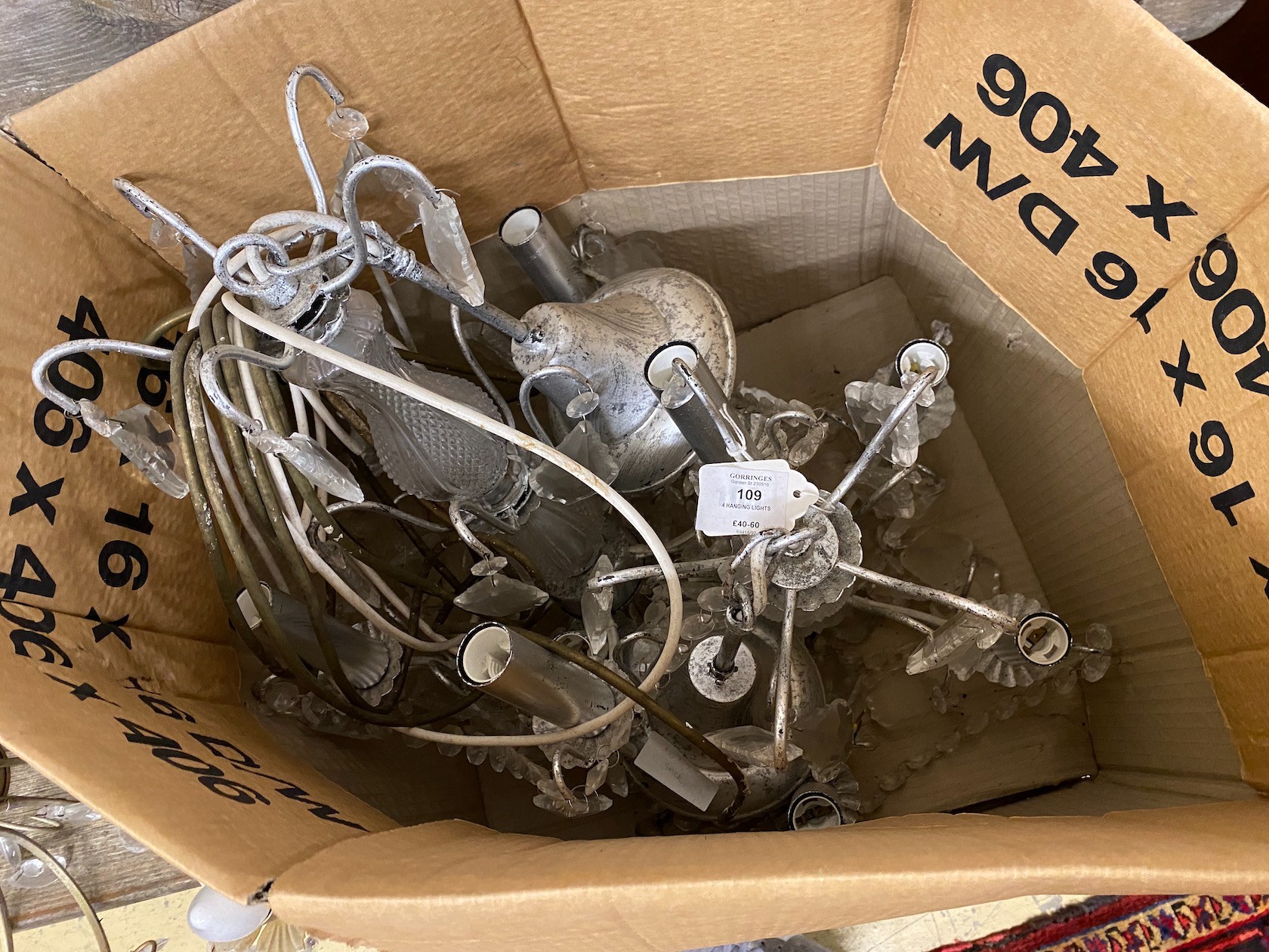 Four assorted hanging ceiling lights, largest height 45cm
